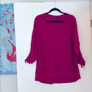 Sweater w/ cinching along arms & bows at wrists